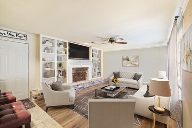Virtually Staged: This photo captures a warm, inviting, and beautifully furnished living room that blends comfort with timeless character.