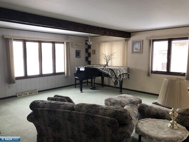 Natural light, spacious and carpeted.