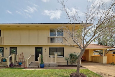 View of front of home featuring an attached carpo