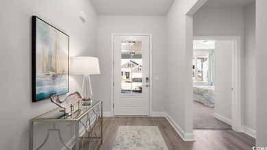 Doorway to outside featuring wood finished floors,