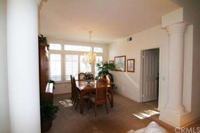 Formal Dining Room framed with Roman Columns