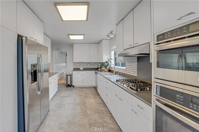 Kitchen view toward front of the home