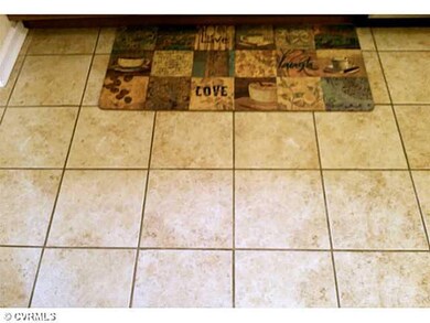 Kitchen - Ceramic tile throughout kitchen, baths a