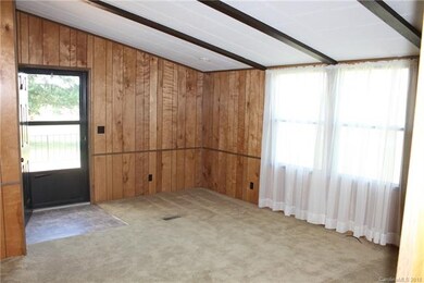 Huge Great Room with front door to the side deck