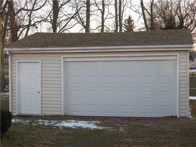 Exterior Front. 2 1/2 car detached garage with an 