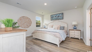 Bedroom featuring hardwood / wood-style flooring