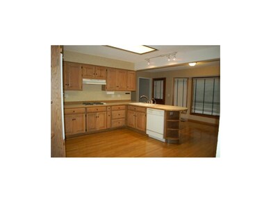 Kitchen with eat area with lots of windows to enjo