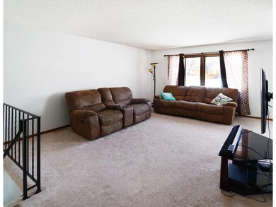 Upper level living room with great light.