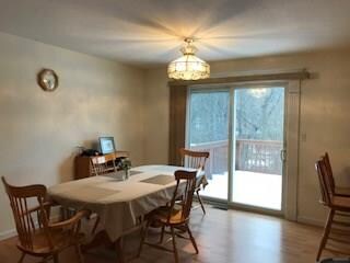 DINING ROOM OFFERS ACCESS TO PRIVATE DECK