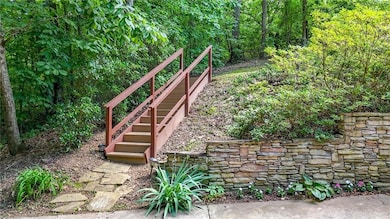 Staris leads to garden area-mature landscape
