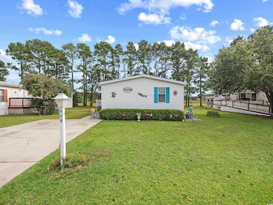 View of front of house with a front lawn