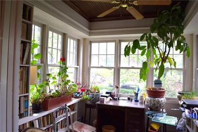 Beautiful Den with windows all around.