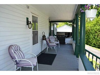 Exterior Front Wrap around porch looking towards t