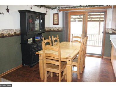 Dining room with patio door to covered deck.