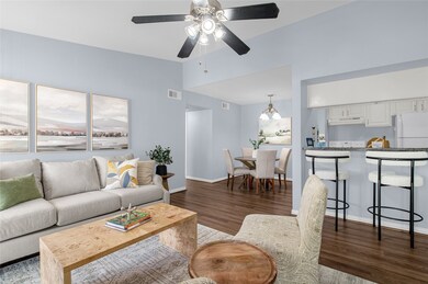 Another view of the living room leading to dining