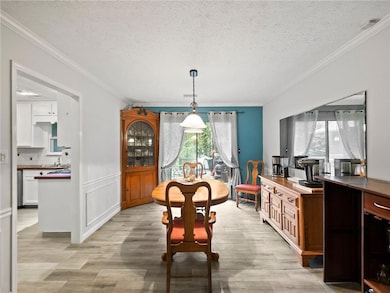 Dining space with plenty of natural light, light w