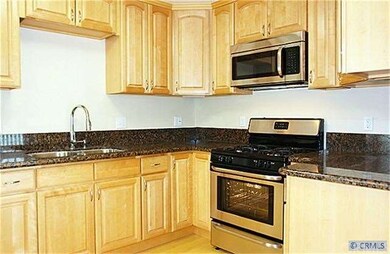 granite countertops, stainless stove, microwave