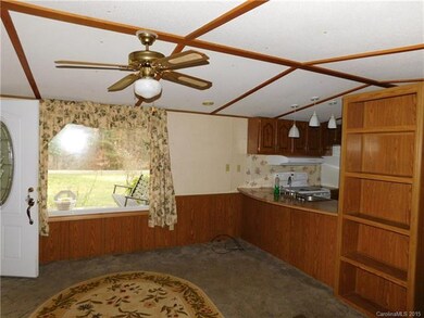 Living room, bar to kitchen.