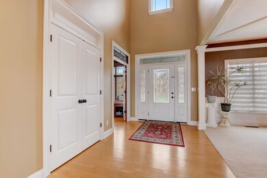 Two-story Entry, Framing Picturesque Water Views Out Back