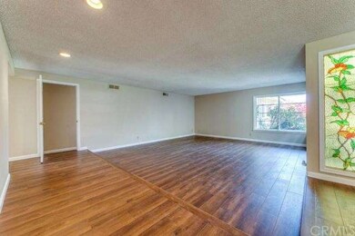 Open and Spacious Living Room and New Laminate Flo