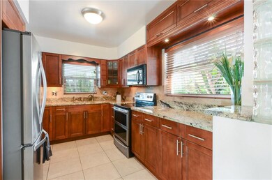 Solid Wood Cabinets & Beautiful Stainless Appliances & Granite Counters
