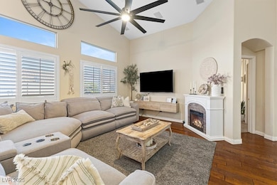 Living area with high vaulted ceiling, a ceiling f
