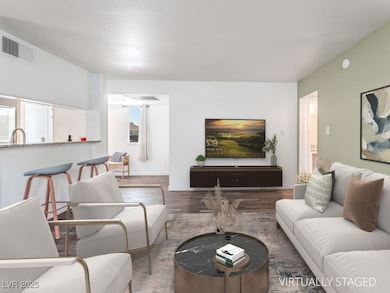 Living area featuring wood finished floors