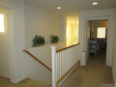 Walk way up the stairs to the bedrooms.