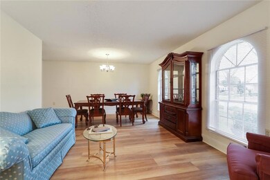 Large windows, beautiful floors bring this room to