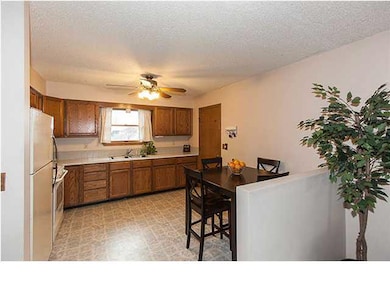 Spacious eat-in kitchen with door to attached gara
