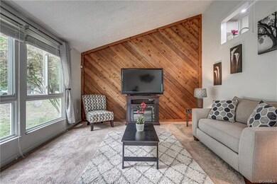 Note the window above the couch, offering a peek b
