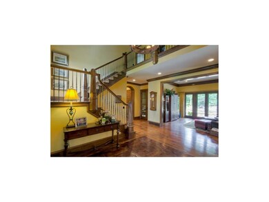 Entry with inlay hand cut and scraped wood floor, 