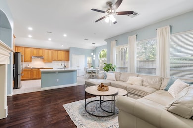 The family room overlooks the kitchen and the brea