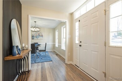 Foyer featuring a wealth of natural light, a notab
