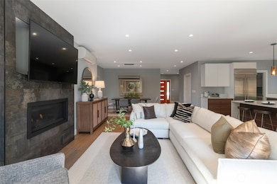 Great room concept with access to outdoor deck.