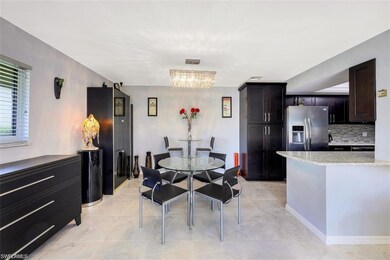 Dining space featuring light tile patterned floori