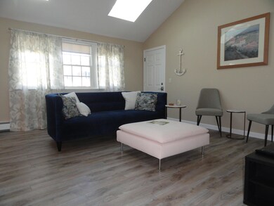 Natural light floods living room