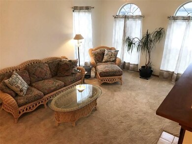 Living Room with cathedral ceiling and Gas fireplace.