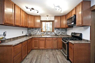 Updated kitchen with new cabinets, counter tops, S