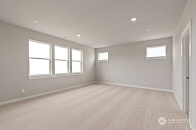 Large Primary Bedroom with Private bath and walk in closet. Colors and materials may vary.