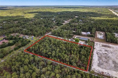 Aerial view of property and surrounding area featu