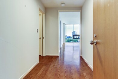 The foyer is large enough for an entry table or co