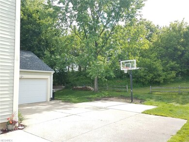 Extra parking or half basketball court.