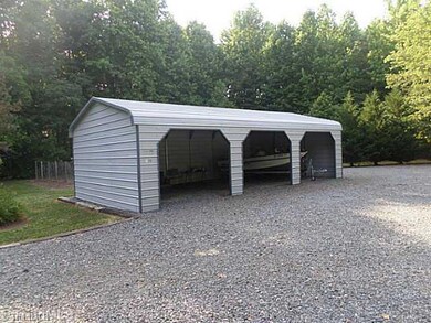 Other. Three bay carport garage