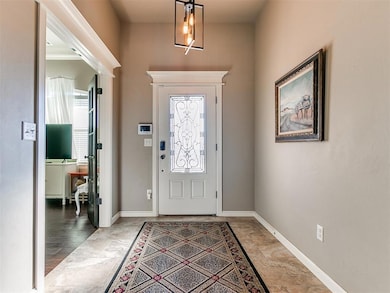 Entrance foyer featuring light hardwood / wood-sty