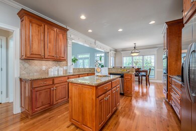 PHOTOS DO NOT DO THIS HOME JUSTICE!  SCHEDULE A TOUR TODAY TO SEE THIS BEAUTY FOR YOURSELF!