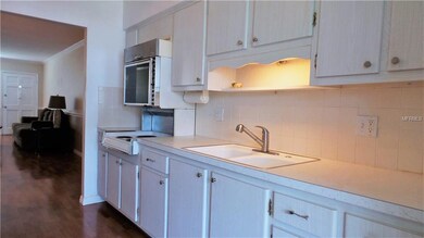 Check out this bright cheery Kitchen.  Plenty of c