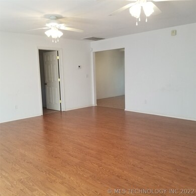 Another view of living room looking toward dining