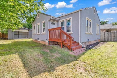 Back of house with crawl space, stucco siding, and