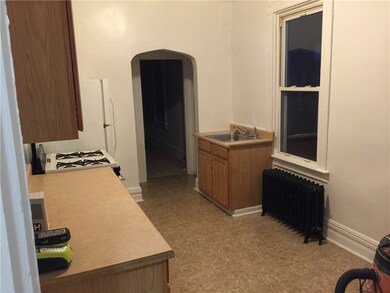 Updated 2nd floor kitchen with gas stove, refrigerator and plenty of cabinet space.